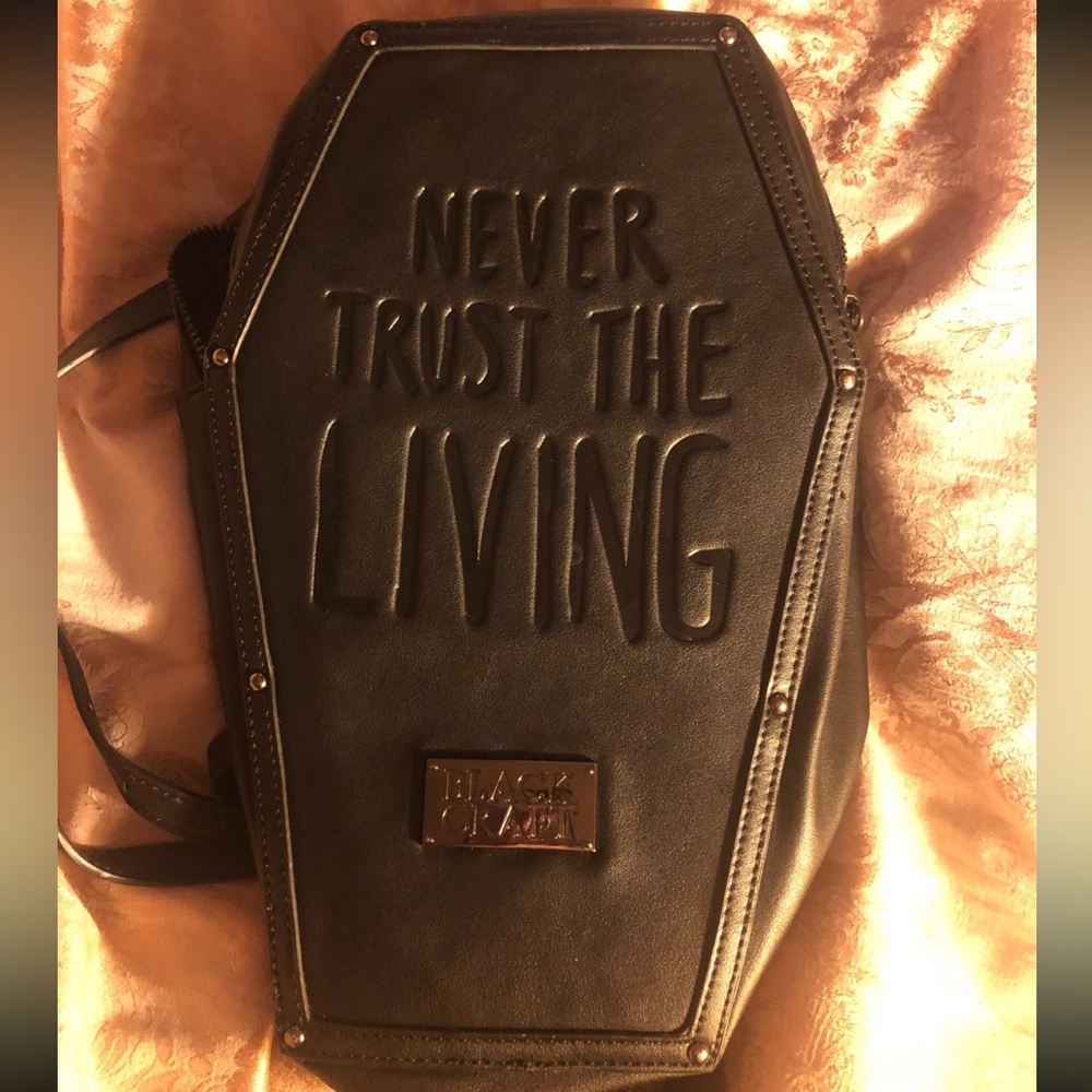 blackcraft cult never trust the living backpack